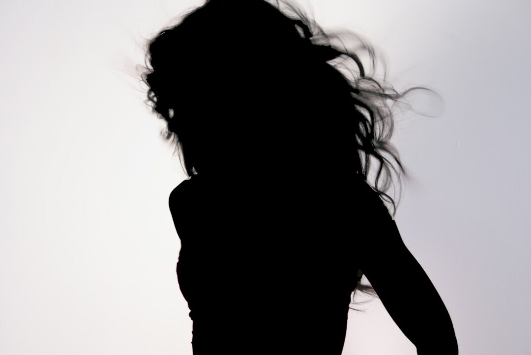 Expressive dancer silhouette in motion with poised posture