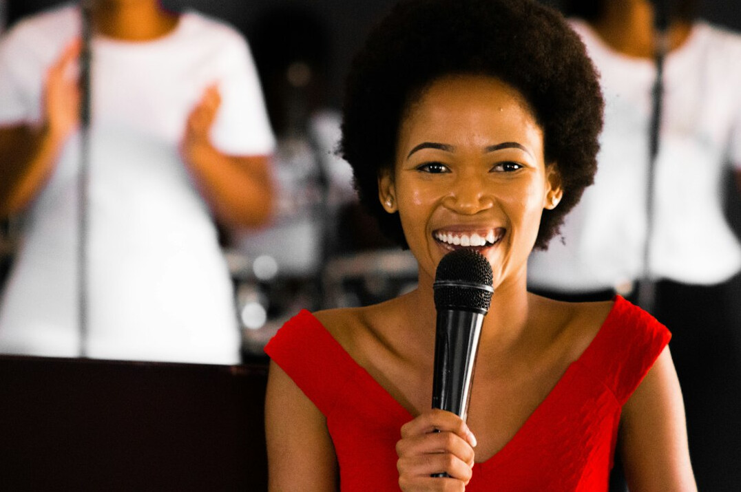 woman practicing voice exercises