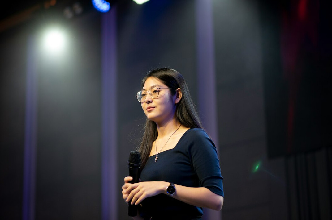 executive on stage speaking