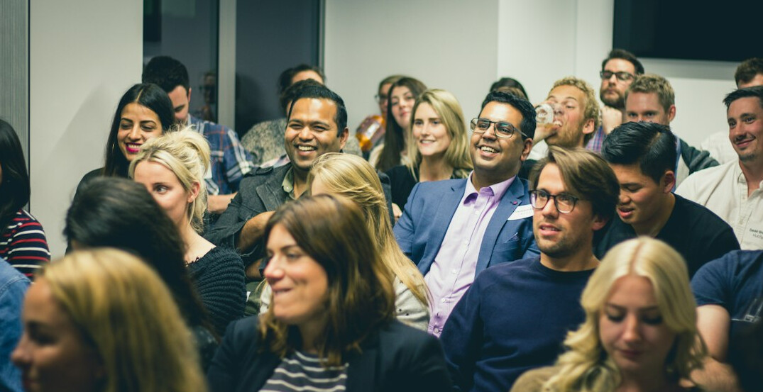 audience listening to speech